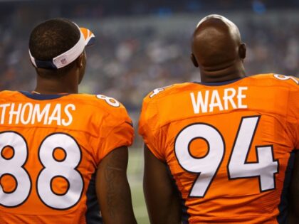 28 AUG 2014: Denver Broncos defensive end DeMarcus Ware (94) and wide receiver Demaryius Thomas (88) look on from the sideline during the final NFL preseason game between the Denver Broncos and Dallas Cowboys at AT&T Stadium in Arlington, TX.