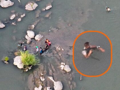 A DPS drone operator spotted an armed smuggler guiding migrants across the Rio Grande near Eagle Pass. (Texas Department of Public Safety)