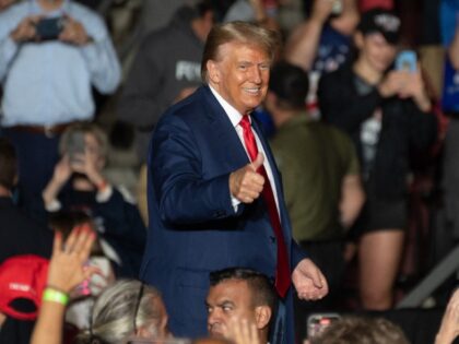 Former US President and 2024 presidential hopeful Donald Trump gives a thumbs up as he leaves after speaking at a campaign rally in Erie, Pennsylvania, on July 29, 2023. (JOED VIERA/AFP via Getty)