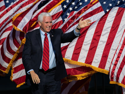 Vice President Mike Pence waves to the crowd as he arrives to a rally in support of Sen. David Purdue (R-GA) and Sen. Kelly Loeffler (R-GA) on December 10, 2020 in Augusta, Georgia. The "Defend the Majority" rally comes ahead of a January 5th runoff election for Purdue who is …
