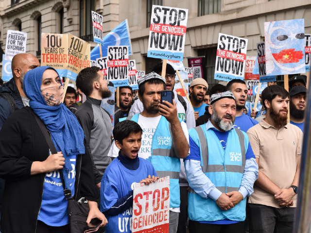 LONDON, UNITED KINGDOM - 2022/07/31: Protesters hold placards expressing their opinion during the demonstration. Uyghurs and UK Muslim organizations gathered opposite the Chinese embassy in London to protest against the Chinese government's involvement in ongoing human rights abuses against Uyghurs and other ethnic minorities. (Photo by Thomas Krych/SOPA Images/LightRocket via Getty Images)
