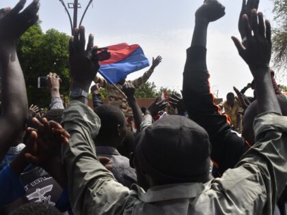 Protesters cheer Nigerien troops as they gather in front of the French Embassy in Niamey during a demonstration that followed a rally in support of Niger's junta in Niamey on July 30, 2023. Thousands of people demonstrated in front of the French embassy in Niamey on Sunday, before being dispersed …