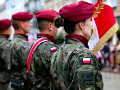 KRAKOW, POLAND - AUGUST 1: Soldiers of the Polish Army on Matejki Square during the 79th anniversary of the outbreak of the Warsaw Uprising on August 1, 2023 in Krakow, Poland. On the 79th anniversary of the Warsaw Uprising, ceremonies commemorating this event were held in Krakow. In St. Mary's …