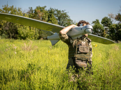 DONETSK OBLAST, UKRAINE - AUGUST 5: Ukrainian soldiers carry their surveillance drone to take off in Donetsk Oblast, Ukraine on August 05, 2023. (Photo by Ignacio Marin/Anadolu Agency via Getty Images)