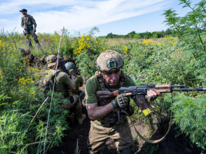 UNSPECIFIED, UKRAINE - JULY 31: Ukrainian soldiers of the 128th Brigade of the Territorial Defense pause from their duties on the southern counteroffensive frontline to refresh their trench-storming and anti-mine tactics, after playing a role in pushing Ukraines frontline five miles south and the recent capture of the village of …