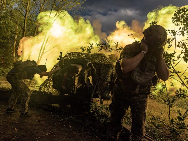 DONETSK OBLAST, UKRAINE - AUGUST 12: Ukrainian soldiers fire the D-30 artillery to Russian positions in the direction of Klishchiivka as the Russia-Ukraine war continues in Donetsk Oblast, Ukraine on August 12, 2023. (Photo by Diego Herrera Carcedo/Anadolu Agency via Getty Images)