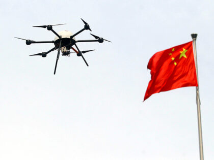 This picture taken on May 12, 2015 shows an unmanned drone aircraft being tested during a campaign for disaster prevention and reduction in Beijing. China forbids any flights, manned or unmanned, without prior approval from the air force, civil aviation authorities and the local air traffic control bureau. CHINA OUT …