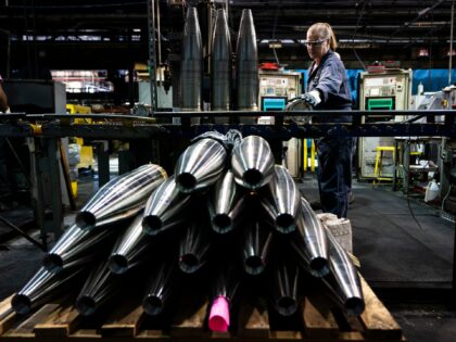A steel worker moves a 155 mm M795 artillery projectile during the manufacturing process at the Scranton Army Ammunition Plant in Scranton, Pa., Thursday, April 13, 2023. One of the most important munitions of the Ukraine war comes from a historic factory in this city built by coal barons, where …