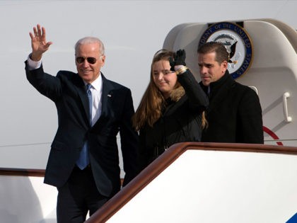 FI:LE - In this Wednesday, Dec. 4, 2013 file photo, U.S. Vice President Joe Biden, left, waves as he walks out of Air Force Two with his granddaughter Finnegan Biden and son Hunter Biden at the airport in Beijing, China. On Friday, Oct. 25, 2019, The Associated Press reported on …