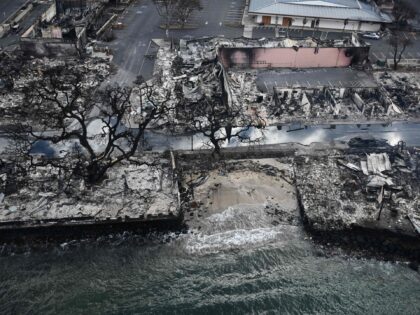 OPSHOT - An aerial image taken on August 10, 2023 shows destroyed homes and buildings on the waterfront burned to the ground in Lahaina in the aftermath of wildfires in western Maui, Hawaii. At least 36 people have died after a fast-moving wildfire turned Lahaina to ashes, officials said August …