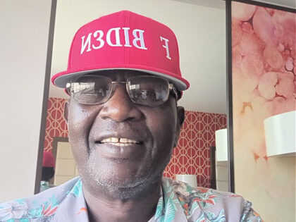 Former President Barack Obama’s older half-brother, Malik Obama, uploaded a photo of himself to social media wearing a hat that read, “F Biden” and told Breitbart News that he is all in supporting former President Donald Trump in 2024.