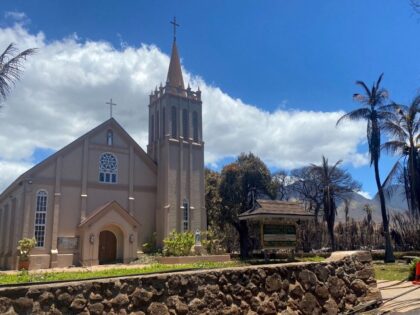 Maria Lanakila Catholic Church on Waine street is seen untouched in the aftermath of a wildfire in Lahaina, western Maui, Hawaii on August 11, 2023. A wildfire that left Lahaina in charred ruins has killed at least 55 people, authorities said on August 10, making it one of the deadliest …
