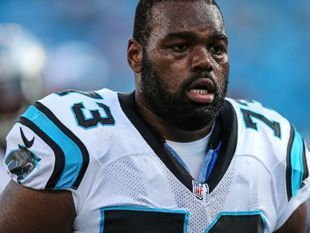 August 22, 2015: Carolina Panthers tackle Michael Oher (73) trots off the field during the pre-season game between the Carolina Panthers and the Miami Dolphins at Bank of America Stadium in Charlotte, NC.The Panthers pull out a late win 31-30 over the Dolphins. (Photo by Jim Dedmon/Icon Sportswire/Corbis/Icon Sportswire via …