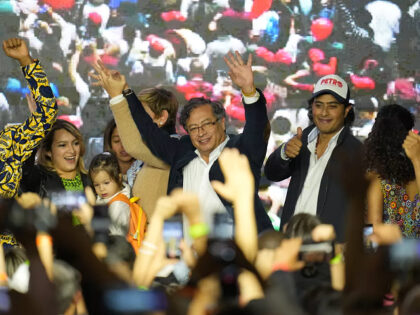 FILE - Presidential candidate Gustavo Petro, center, waves to supporters alongside his family on election night in Bogota, Colombia, Sunday, May 29, 2022. Petro's son Nicolas Petro Burgos, right, is under investigation for money laundering as of March 3, 2023, according to the prosecutor's office. (AP Photo/Fernando Vergara, File)