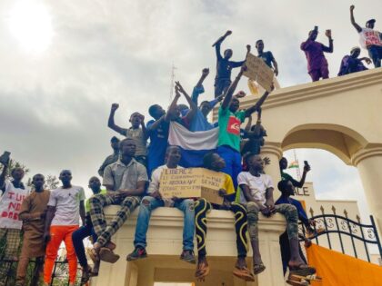 Supporters of Niger's ruling junta gather at the start of a protest called to fight for the country's freedom and push back against foreign interference in Niamey, Niger, Thursday, Aug. 3, 2023. The march falls on the West African nation's independence day from its former colonial ruler, France, and as …