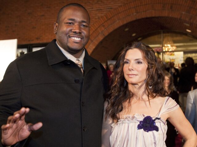 NEW ORLEANS - NOVEMBER 19: Actor Quinton Aaron and actress Sandra Bullock attend "The Blind Side" benefit premiere at the Prytania Theatre on November 19, 2009 in New Orleans, Louisiana. (Photo by Skip Bolen/WireImage)