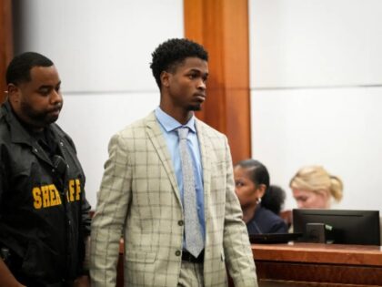 Son of Murdered NFL Player Convicted in Slaying, Wife Flees Courtroom in Tears