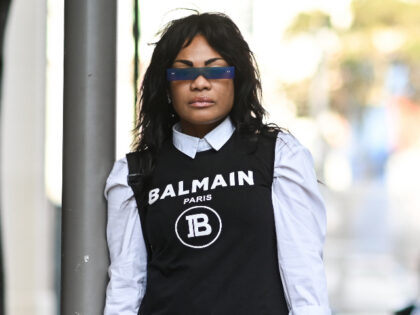 MIAMI, FLORIDA - DECEMBER 02: Trevian Kutti is seen wearing a Balmain top and white shirt dress on December 02, 2021 in Miami, Florida. (Photo by Daniel Zuchnik/Getty Images)
