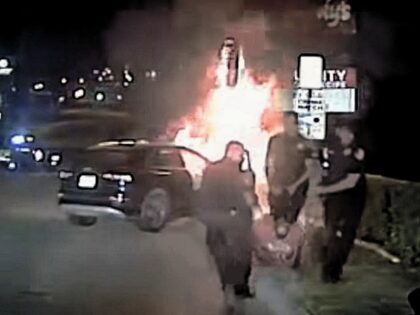 White Settlement Texas Police officers save victim from a burning car. (White Settlement Police Department)