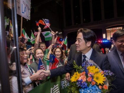 In this photo released by the Taiwan Presidential Office, Taiwan's Vice President William Lai, second right, shakes hands with his supporters upon arrival in New York on Sunday, Aug. 13, 2023. Lai left Taiwan Saturday on a trip to Paraguay to reinforce relations with his government's last diplomatic partner in …