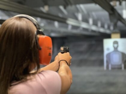 Woman at shooting range