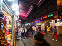 A woman shops off Little North Road, part of an ethnically diverse quarter in Guangzhou known as Little Africa before the city's COVID-19 outbreak (BETSY JOLES/GETTY IMAGES).